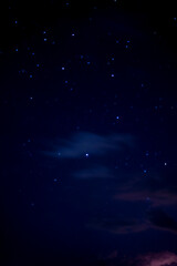 Fototapeta premium The night sky has stars and clouds