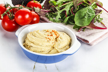 Creamy hummus in the bowl