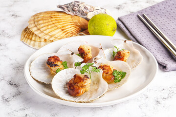 Grilled scallops shell with butter