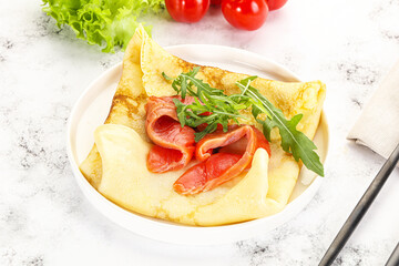 Russian pancake with salmon fish