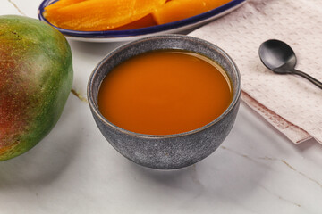 Sweet mango puree in the bowl