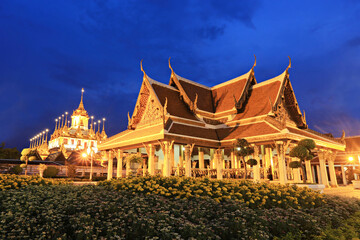 Wat Ratchanaddaram and Loha Prasat Metal Castle at twilight, Bangkok, Thailand 