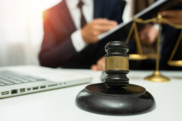 team meeting.businessman discussing legal legislation at law firm. judge gavel 