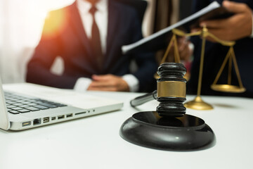 team meeting.businessman discussing legal legislation at law firm. judge gavel 