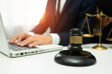 team meeting.businessman discussing legal legislation at law firm. judge gavel 