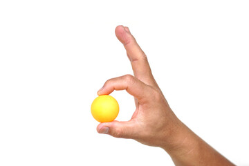 Hand holding orange table tennis ball or Ping pong ball, isolated on white background. concept, sport equipment. Exercise and workout tool. Competitive game sport.      