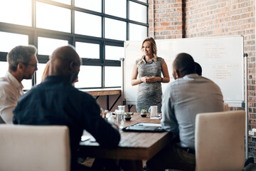 Presentation, woman and meeting on whiteboard in office for feedback, planning and ideas of...