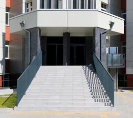 Grand staircase and lift for the disabled in an office building