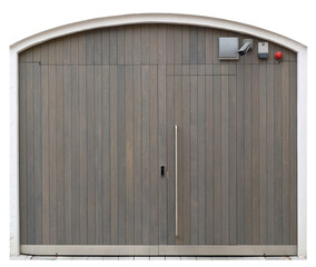 Sturdy steel gates decorated with wooden planks. Isolated