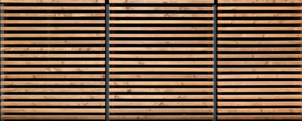 Fragment of a protective panel made of square wooden planks