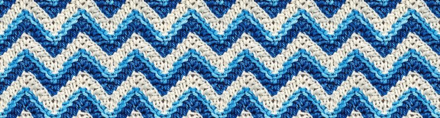 Crochet Seamless Pattern with Horizontal Chevron Stripes in Blue and White Colors