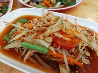 Spicy Papaya Salad with Peanuts and Shrimp
