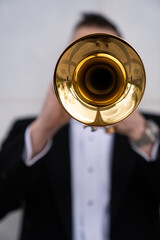 Trumpet player in tux and tails © Cavan