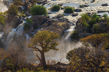 Epupa Falls (also known as Monte Negro Falls in Angola) is a series of large waterfalls formed by...
