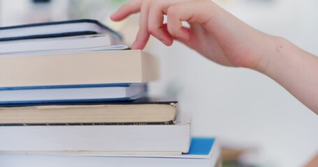 A Young Student Climbs Through the Number of Books