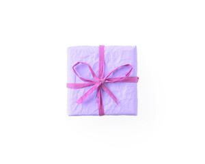Top view of crumpled paper lavender color present box with recycled paper ribbon isolated on white