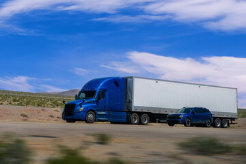 Fototapeta premium Trucks on the Highway, USA. Trucking in Utah , USA