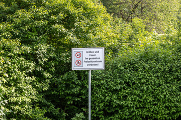 Warning sign with a barbecue grill forbidden to grill
