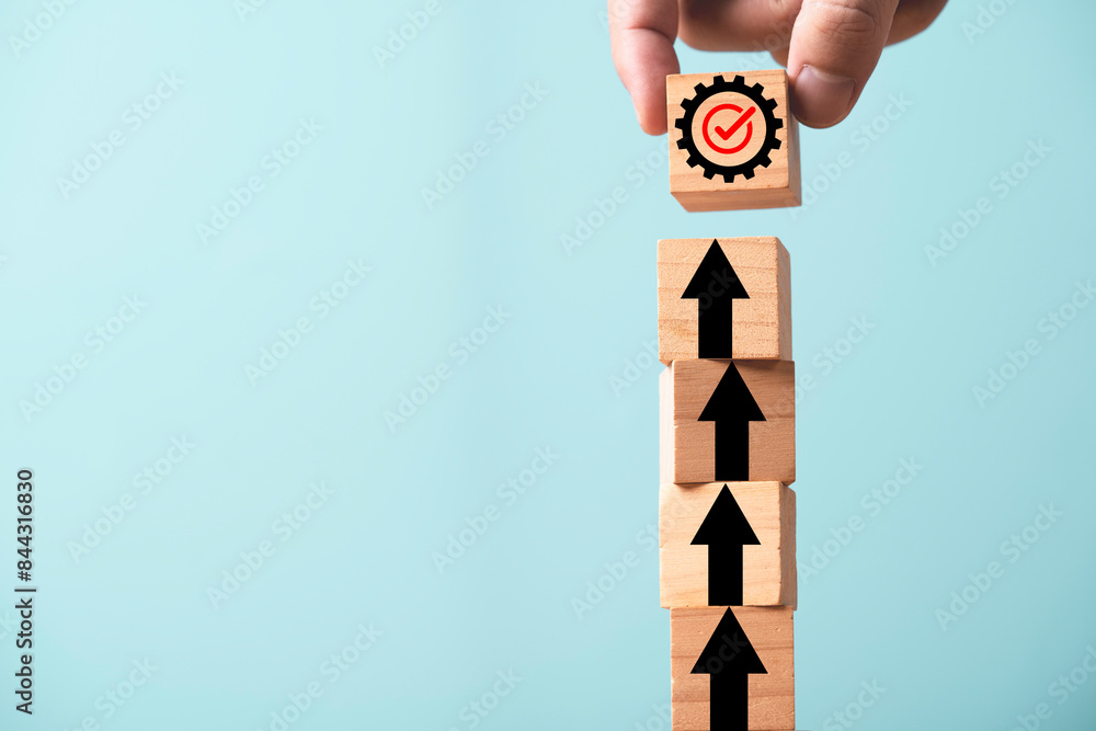 Poster hand putting mechanical gear and increasing graph on the top of up arrow for continuous productivity