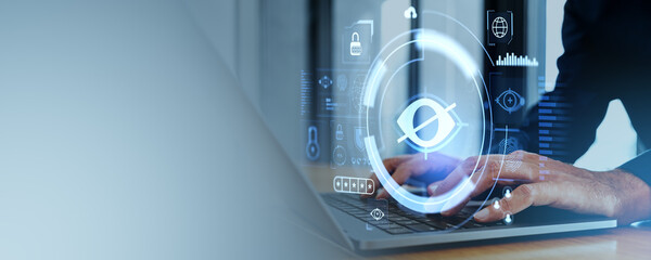 Man hands with laptop, sensitive content hologram, crossed eye. Copy space