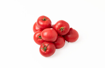Ripe tomatoes on an isolated background