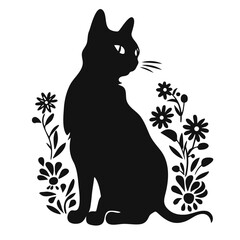 A black cat sitting among flowers