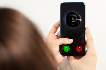 Phone Scam, incoming call from a scammer on a smartphone screen, online fraud, privacy invasion, identity theft.