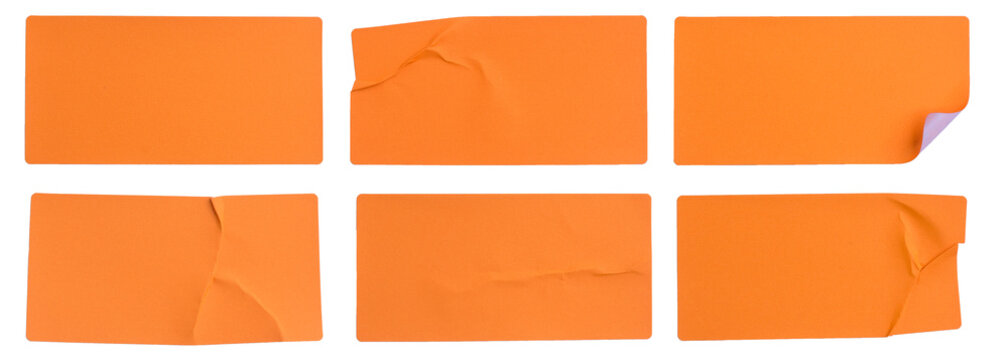 A set of fluorescent neon orange rectangular paper sticker label isolated on white background.
