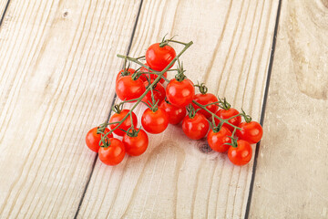 Ripe sweet Cherry tomato branch