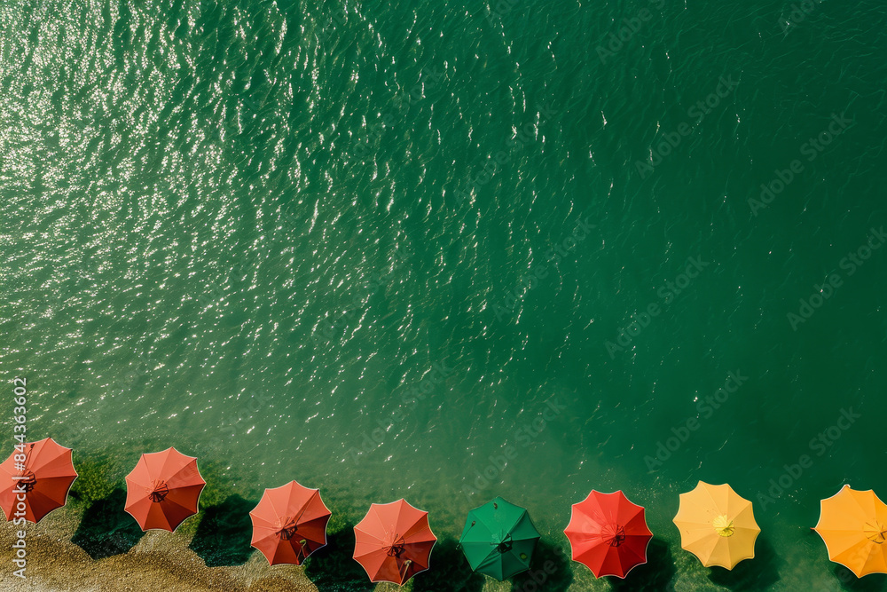 Poster a row of umbrellas are floating on the water