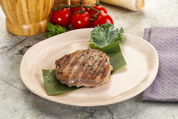 Grilled tuna medallion in the plate