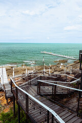 Wooden staircase leading down to a beach