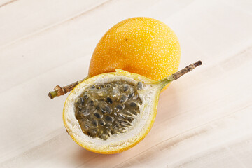 Yellow granadilla with cut half