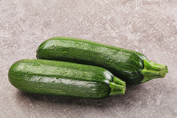 Raw green ripe zucchini vegetable