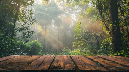Empty wooden table for presenting products on a natural forest background. Vintage tone, light tones.
