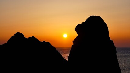 壱岐島のシンボルである猿岩の夕焼けの風景