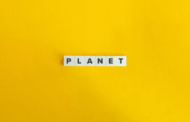 Planet Word. Text on Block Letter Tiles on Flat Background. Minimalist Aesthetics.