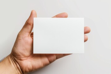 Obraz premium Blank White Card Mockup on Hand created with Generative AI