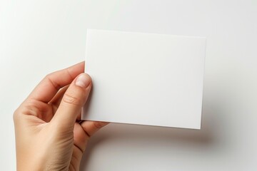Obraz premium Blank White Card Mockup on Hand created with Generative AI