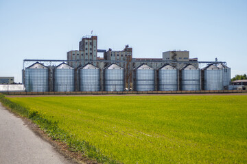silos granary elevator on agro-industrial complex with seed cleaning and drying line for grain storage © hiv360