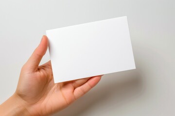 Fototapeta premium Blank White Card Mockup on Hand created with Generative AI