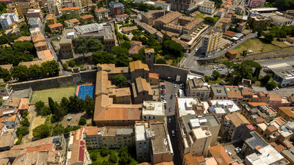 Fototapeta premium Aerial view of Porta Romana. It was one of the entrances into the medieval city of Viterbo, Lazio, Italy. Today it is the gateway to the historic center of the city.