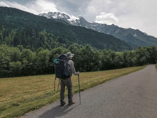 Man hiking in the mountains, the Tour du Mont Blanc.