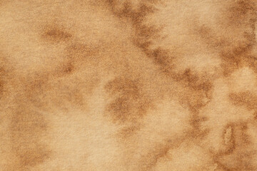 close up of paper texture aged using liquid coffee