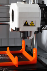 Fototapeta premium 3D Printer | orange filament object