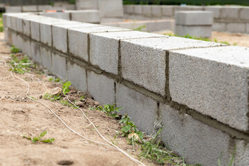 The foundations of a house made of expanded clay blocks, the frame of a new house in the process of construction