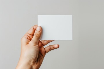 Fototapeta premium Blank White Card Mockup on Hand created with Generative AI