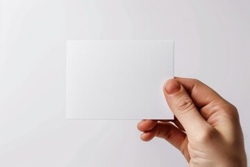 Obraz premium Blank White Card Mockup on Hand created with Generative AI