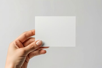 Fototapeta premium Blank White Card Mockup on Hand created with Generative AI