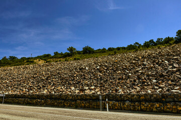 Road from Cordoba through Sierra Madrona, Fuencaliente, Protection for vehicle traffic, Ciudad Real province, Spain
